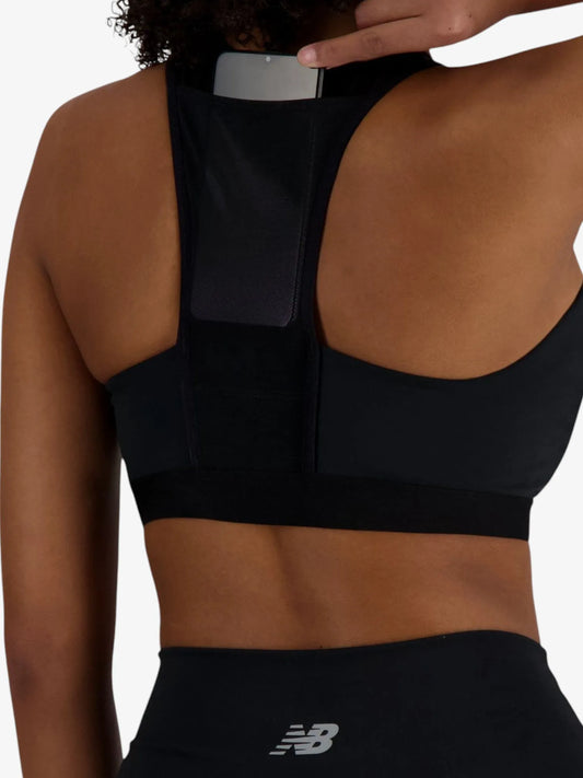 Top Deportivo New Balance NB Sleek Medium Support Pocket Zip Training