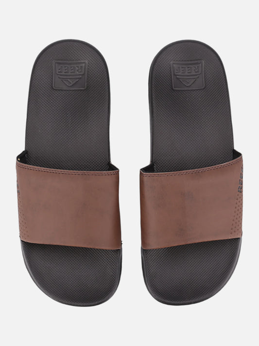 Ojota Reef Leather Slide Ul Marrón Oscuro